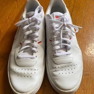 Nike white sneakers.